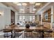Large lounge featuring community tables, a fireplace, and comfortable seating at 3701 Arapahoe Ave # 318, Boulder, CO 80303