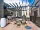 Stylish outdoor kitchen and dining area with a grill, seating, and modern design at 3701 Arapahoe Ave # 318, Boulder, CO 80303