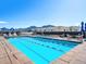 The rooftop pool area features a hot tub, lounge chairs, and mountain views at 3701 Arapahoe Ave # 318, Boulder, CO 80303