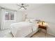 Bedroom with lots of natural light, ceiling fan, neutral paint at 6167 S Pierson St, Littleton, CO 80127