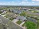 An aerial view showcasing the home's location in a vibrant neighborhood near local school at 18714 E Utah Cir, Aurora, CO 80017