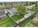 An aerial view of a home featuring a large backyard, mature trees, and well-maintained landscaping at 18714 E Utah Cir, Aurora, CO 80017