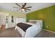Comfortable bedroom with ceiling fan, large closet, and plenty of natural light at 18714 E Utah Cir, Aurora, CO 80017