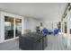 Covered patio featuring outdoor furniture, grill, and access to an open backyard with natural light at 18714 E Utah Cir, Aurora, CO 80017