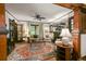 Cozy living room with a fireplace, stylish decor, and a decorative rug at 2131 Eliot St, Denver, CO 80211