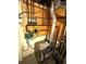 Basement mechanical room with boiler and plumbing at 1927 S Xenon St, Lakewood, CO 80228