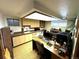 Finished basement office space with built-in cabinetry and workspace at 1927 S Xenon St, Lakewood, CO 80228