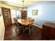 Dining room with wood table and hutch at 1927 S Xenon St, Lakewood, CO 80228