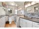 Renovated bathroom with glass enclosed shower and updated fixtures at 8851 Blue Creek Rd, Evergreen, CO 80439