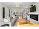 Stylish living area with an open layout connecting the kitchen, dining, and seating spaces at 3885 Vrain St, Denver, CO 80212