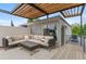 Relaxing rooftop deck with plush seating, pergola, and neighborhood views at 3885 Vrain St, Denver, CO 80212