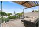 Inviting rooftop deck with pergola, comfortable seating, and neighborhood views at 3885 Vrain St, Denver, CO 80212