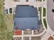 Birds-eye view of a modern, single-Gathering home featuring a well-maintained dark gray roof and manicured landscaping at 7265 S Millbrook Ct, Aurora, CO 80016