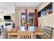 Open dining area with sliding glass doors and a view of the backyard at 7265 S Millbrook Ct, Aurora, CO 80016