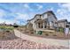 Charming two-story home with a covered porch and landscaped front yard, perfect for curb appeal at 7265 S Millbrook Ct, Aurora, CO 80016