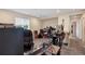 Modern office featuring dual monitors, ample lighting, and comfortable seating, creating an ideal workspace at 7265 S Millbrook Ct, Aurora, CO 80016