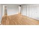 Expansive bedroom with hardwood flooring, multiple closets, and adjacent bath at 12893 W Alameda Dr, Lakewood, CO 80228