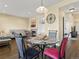 Open dining area adjacent to a living room and kitchen; great room concept at 18554 E Vassar Dr, Aurora, CO 80013