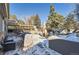 Large backyard with patio, fire pit, and playset at 5760 S Geneva St, Greenwood Village, CO 80111