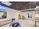 Finished basement with play area and home gym at 5760 S Geneva St, Greenwood Village, CO 80111
