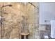Clean bathroom with a walk-in shower and tile surround at 5760 S Geneva St, Greenwood Village, CO 80111