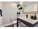 Modern bathroom with floating vanity and updated fixtures at 5760 S Geneva St, Greenwood Village, CO 80111