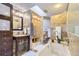 Spa-like bathroom with soaking tub and walk-in shower at 5760 S Geneva St, Greenwood Village, CO 80111