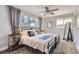 Spacious bedroom with a queen-size bed and ample natural light at 5760 S Geneva St, Greenwood Village, CO 80111