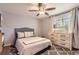 Bright bedroom with a comfortable bed and plenty of closet space at 5760 S Geneva St, Greenwood Village, CO 80111