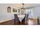 Formal dining room with hardwood floors and a chandelier at 5760 S Geneva St, Greenwood Village, CO 80111
