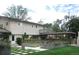 House exterior with landscaped gardens and walkway at 5760 S Geneva St, Greenwood Village, CO 80111
