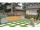 Relaxing garden with stone pathway and wood bench at 5760 S Geneva St, Greenwood Village, CO 80111