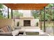 Outdoor patio with fireplace and comfortable seating at 5760 S Geneva St, Greenwood Village, CO 80111