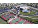 Aerial view showcasing community amenities, including tennis courts and a pool at 3466 Craftsbury Dr, Highlands Ranch, CO 80126