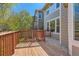 Enjoy outdoor living on this wooden back deck, perfect for entertaining or relaxing at 3466 Craftsbury Dr, Highlands Ranch, CO 80126