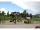 Fun community playground with slides, swings, and climbing structures for enjoyment at 3466 Craftsbury Dr, Highlands Ranch, CO 80126