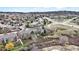 Aerial view of the apartment complex situated in a residential area with nearby roads and community amenities at 1263 S Gilbert St, Castle Rock, CO 80104