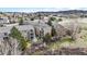 Aerial view showcases a well-maintained apartment complex surrounded by lush greenery and landscaping at 1263 S Gilbert St, Castle Rock, CO 80104