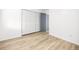 Spacious bedroom featuring hardwood floors, a large closet, and a gray door at 1263 S Gilbert St, Castle Rock, CO 80104