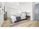 Cozy bedroom with hardwood floors, a ceiling fan, and a large closet at 1263 S Gilbert St, Castle Rock, CO 80104
