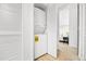 Convenient laundry area with stacked washer and dryer, next to a closet in a bright space at 1263 S Gilbert St, Castle Rock, CO 80104