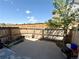 Small concrete backyard with wooden fence. Great space for gardening and outdoor living at 1120 S Waco St # A, Aurora, CO 80017