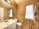 Bathroom features a single sink, updated vanity, and a decorative shower curtain at 1120 S Waco St # A, Aurora, CO 80017