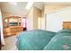 Comfortable bedroom with a vaulted ceiling, sky lights and ample closet space at 1120 S Waco St # A, Aurora, CO 80017