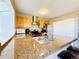 Modern kitchen with granite countertops, stainless steel appliances, and ample storage space at 1120 S Waco St # A, Aurora, CO 80017