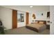 Cozy bedroom with ample natural light, contemporary décor, and relaxing ambiance at 46517 Sunflower Ln, Bennett, CO 80102