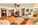 Charming living room with wood floors, vintage accents, and plenty of natural light at 963 N Logan St # 2, Denver, CO 80203