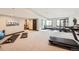 Spacious basement fitness area with a treadmill, weights, and workout equipment at 14209 Beebalm Loop, Parker, CO 80134