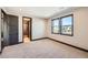 Bright, carpeted bedroom with natural light at 14209 Beebalm Loop, Parker, CO 80134