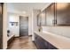 Well-organized mud room featuring a bench, storage cabinets, and easy access to the outside at 14209 Beebalm Loop, Parker, CO 80134